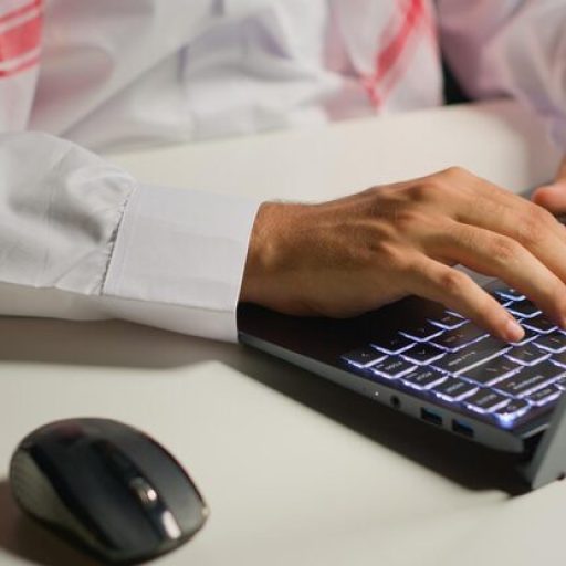 businessman-using-laptop-mouse_482257-87092