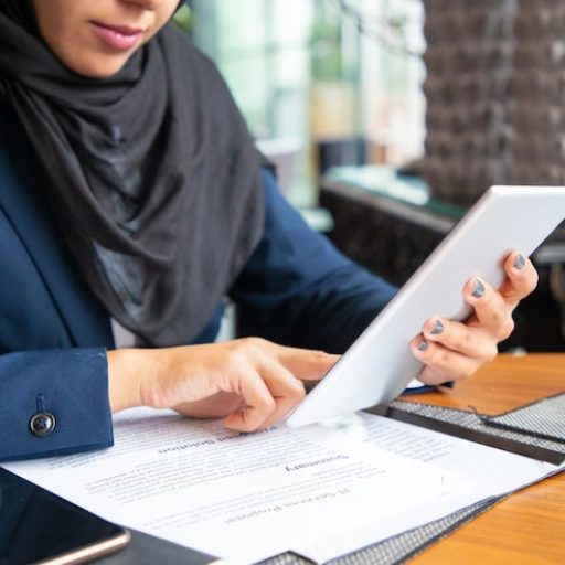 businesswoman-reading-contract-consulting-internet_74855-1117