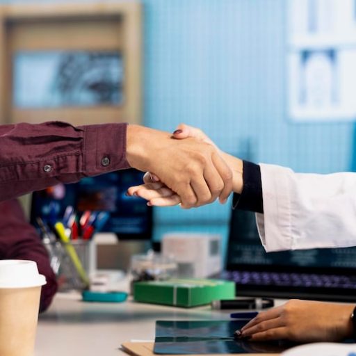 indian-physician-patient-shaking-hands-medical-consultation_482257-123877