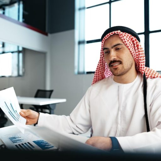 young-successful-arab-businessman-working-office_93675-148140